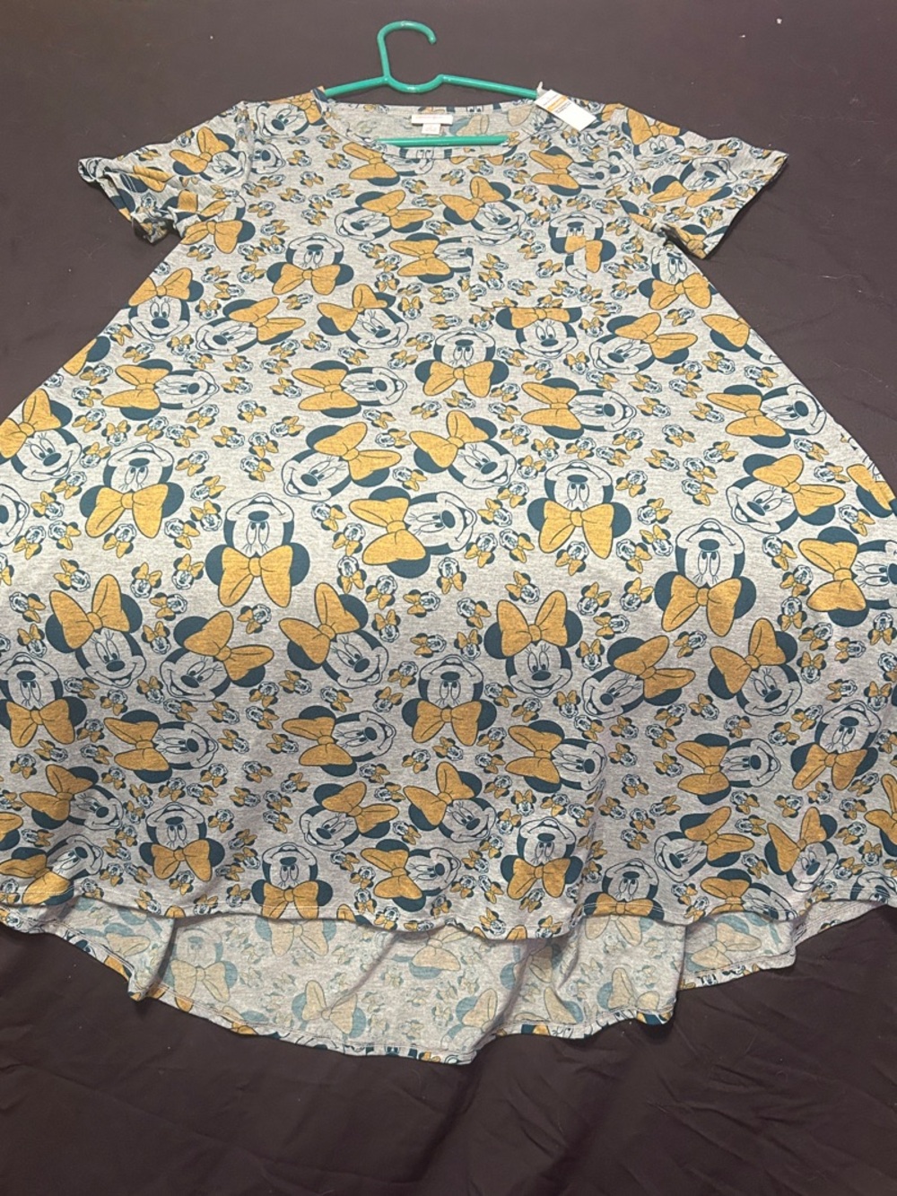 Grey LuLaRoe Carly dress featuring a Minnie Mouse pattern with yellow bows.